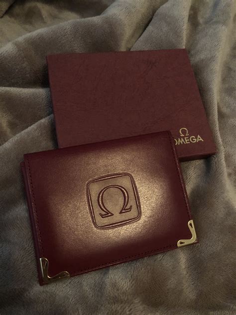 symbol collection omega wallet brown today's retail price|Omega De Ville .